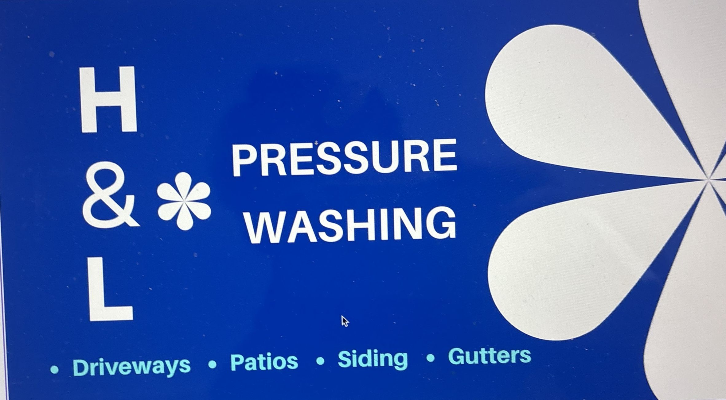 HL Pressure Washing sign used as brand reference